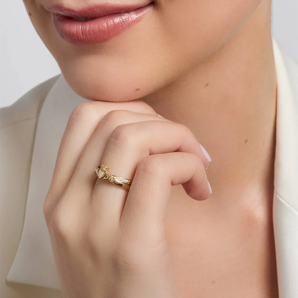 Model Wearing 9ct Yellow Gold Intertwined CZ Claddagh Ring