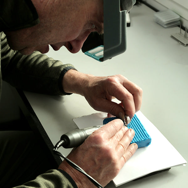 jewellery maker working on a ring